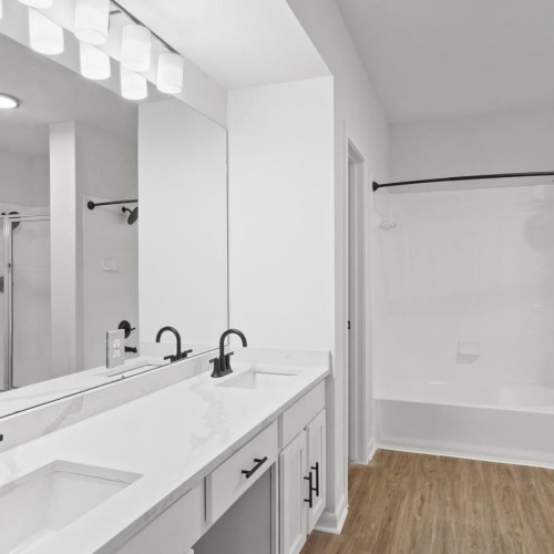 Bathroom options with thoughtful details a bathroom with a large mirror