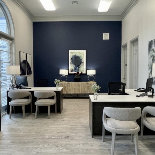 Find your perfect fit at Paramount at Kingwood a room with a desk and chairs